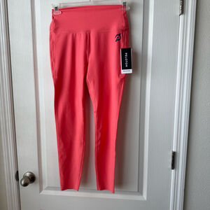 NEW Women's Peloton Instructor Leggings Size M Coral Activewear